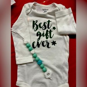 Baby Christmas onesie + teething tether.
